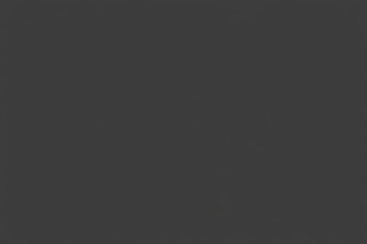 A solid dark gray background with a subtle matte texture.